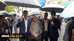 فریادهای بلند استکبار ستیز دانشگاه فرهنگیان استان کردستان همگام با مردم شهر زیر بارش شدید باران 8