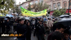 فریادهای بلند استکبار ستیز دانشگاه فرهنگیان استان کردستان همگام با مردم شهر زیر بارش شدید باران 9