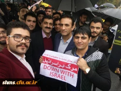 فریادهای بلند استکبار ستیز دانشگاه فرهنگیان استان کردستان همگام با مردم شهر زیر بارش شدید باران 11